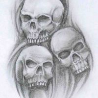 Wzór na tatuaż z trzema czaszkami