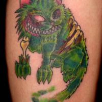Zielony kotek tatuaż